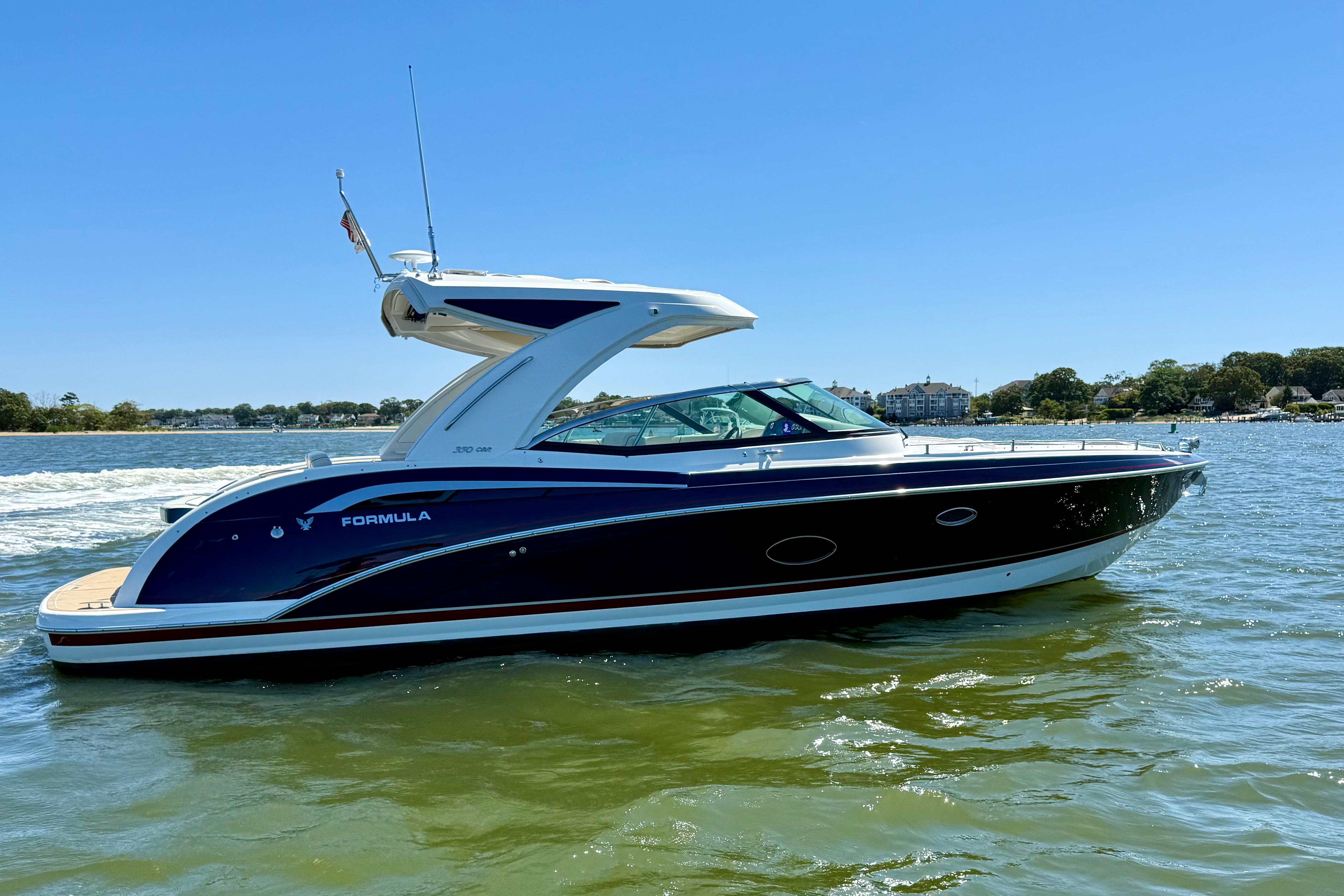 A bowrider under way on open water